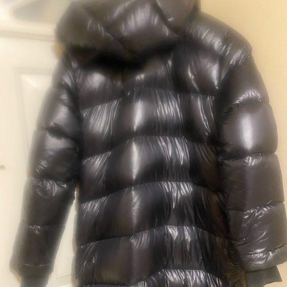 The Aritzia Super Puff Long - Hi-Gloss in black - Picture 2 of 4